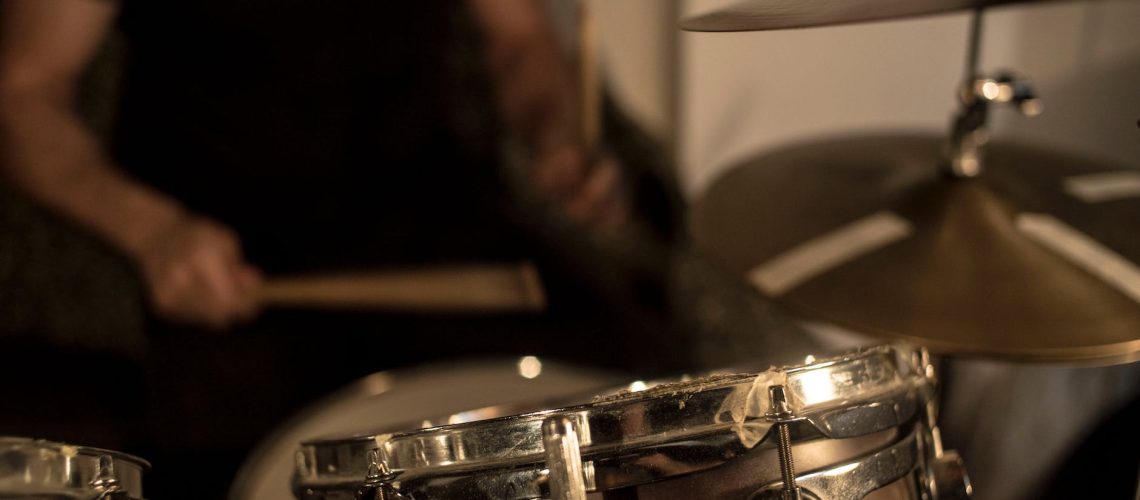 person playing drums