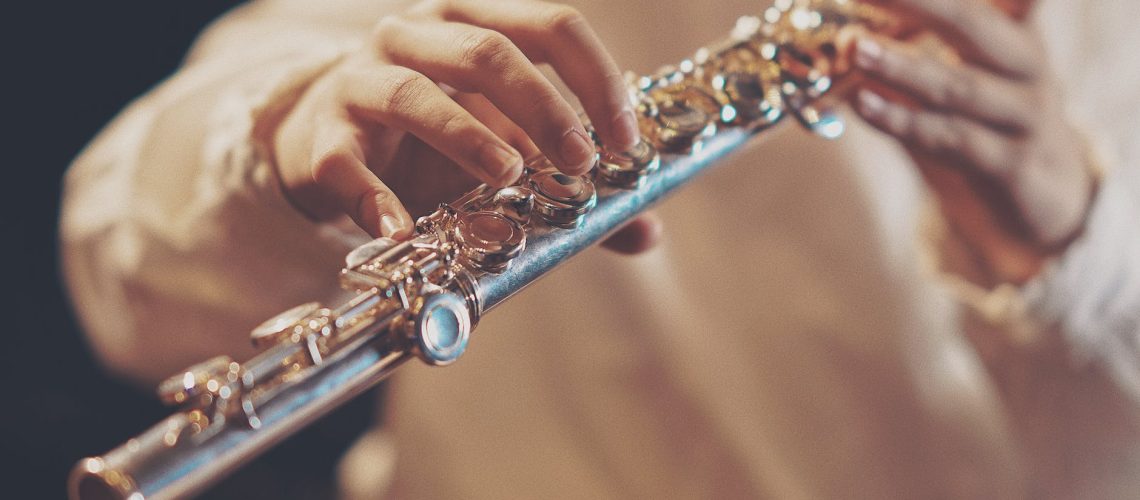 person playing wind instrument