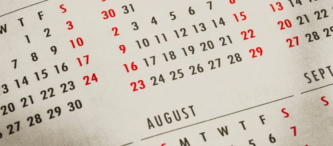 paper calendar with months and days in sunbeam